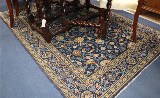 A Tabriz blue ground rug 208 x 145cm